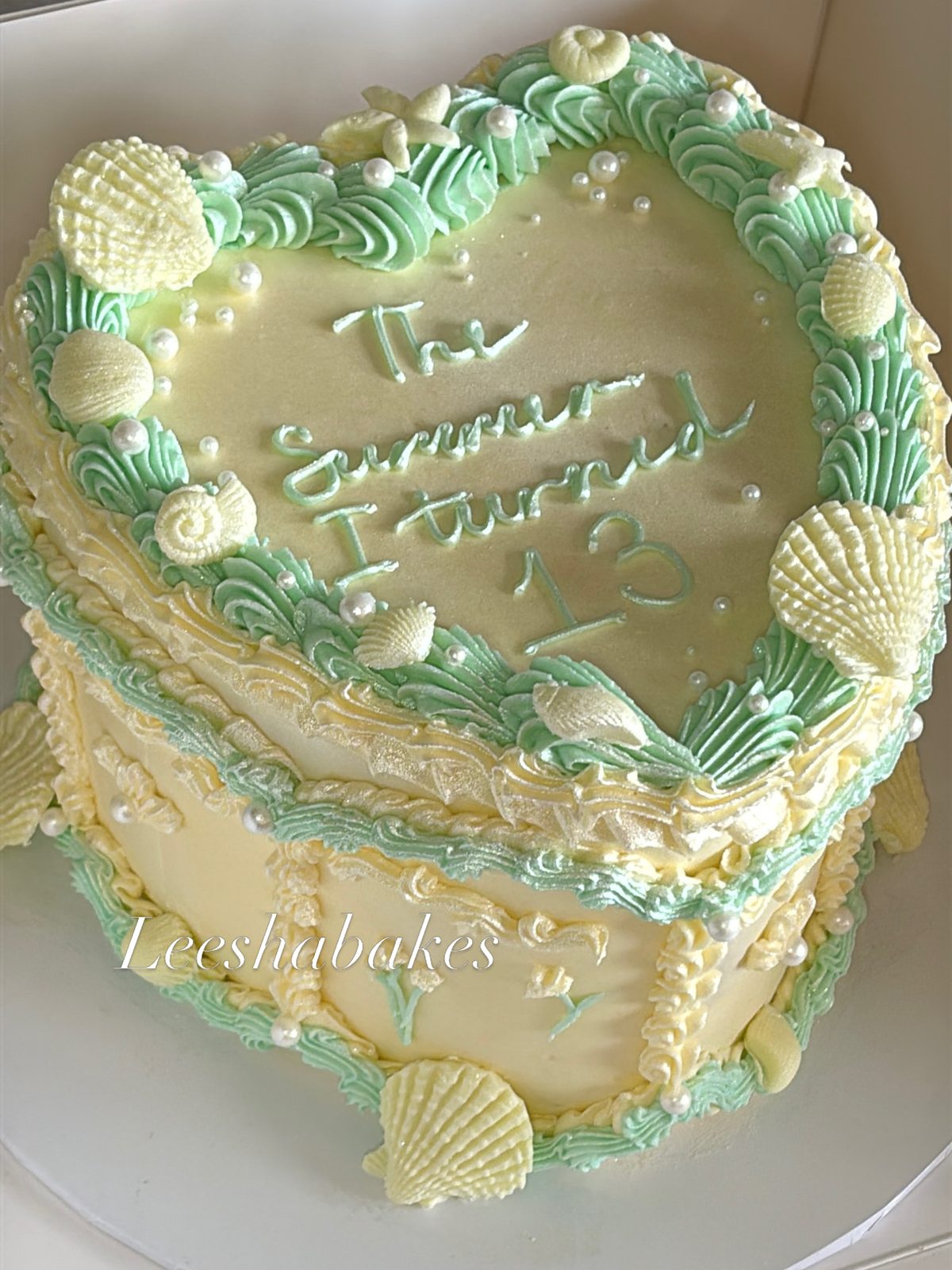 Mermaid heart cake with seashells