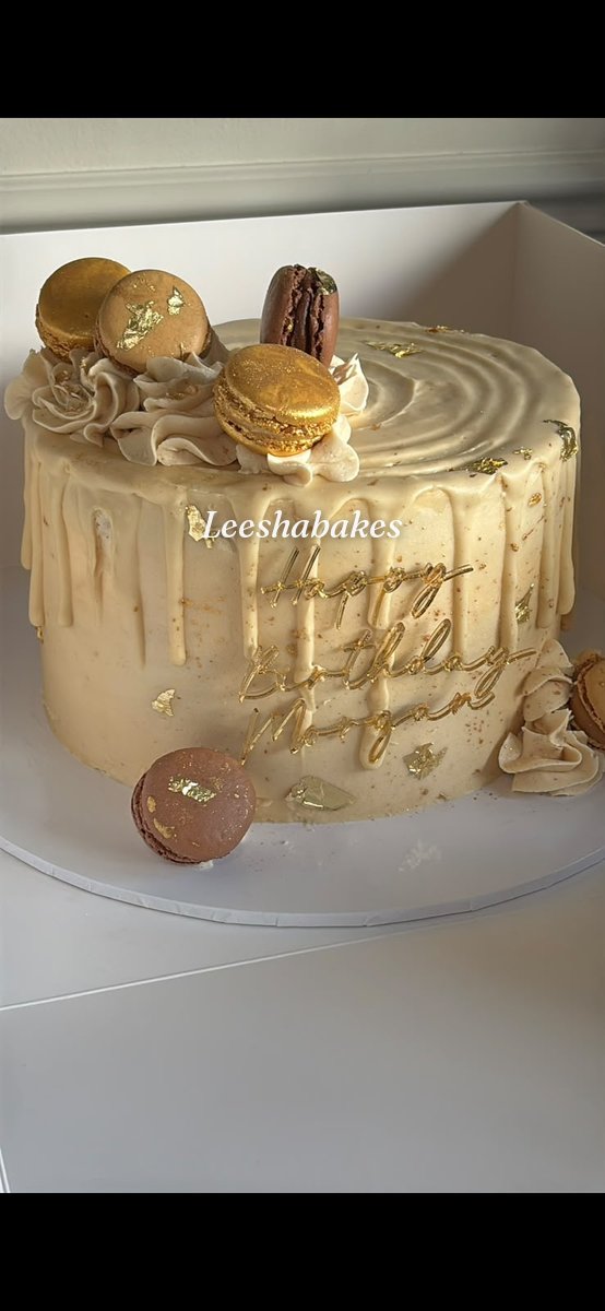 Caramel drip cake with gold leaf, macarons and 'Happy Birthday Morgan' message