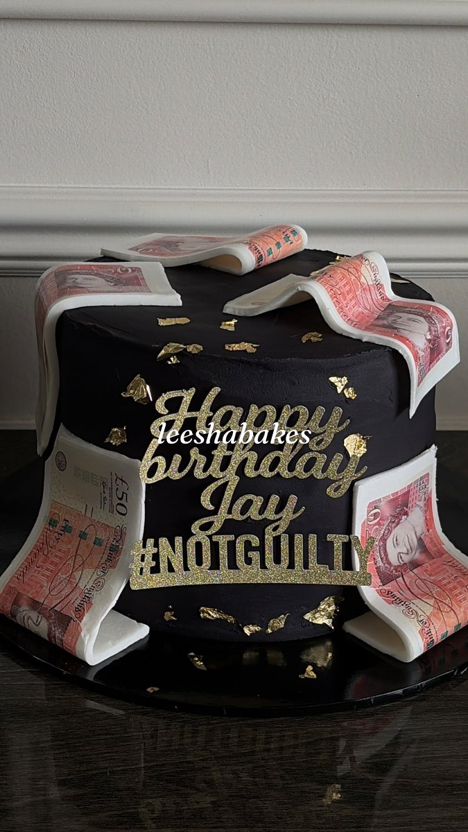 Black buttercream cake with edible £50 notes, gold leaf and a gold 'Happy Birthday Jay' topper